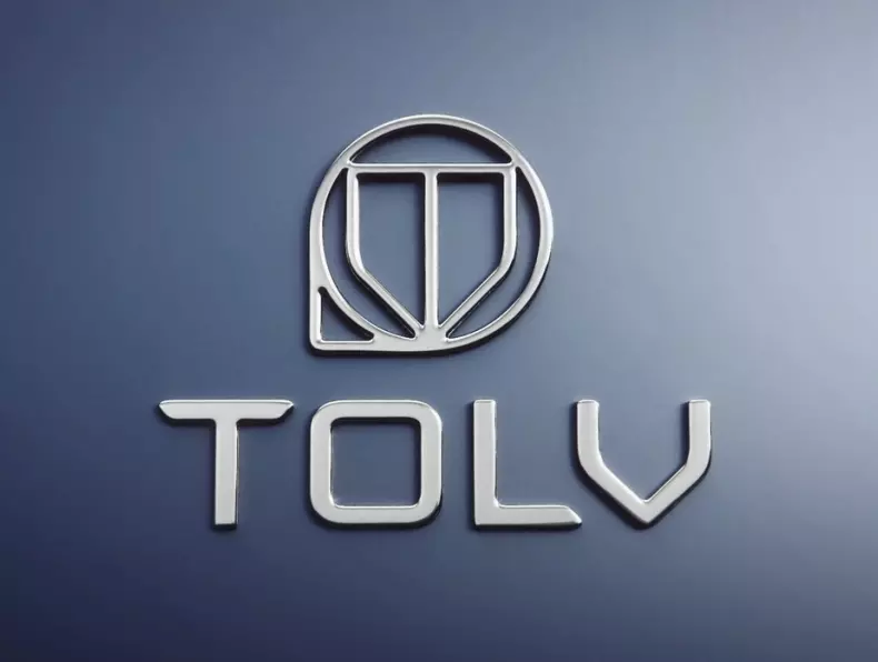 Logo TOLV en version métallique sur fond gris - Tolv